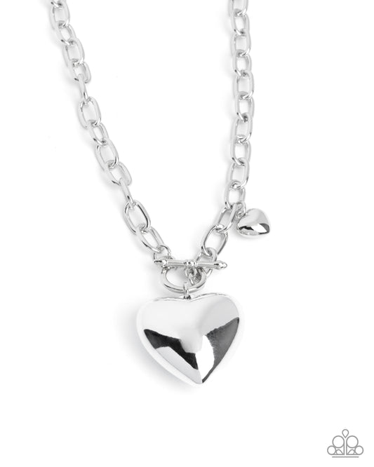 Heartfelt Hangout - Silver Oversized Heart Lariat Closure Pendant Necklace Paparazzi N3509