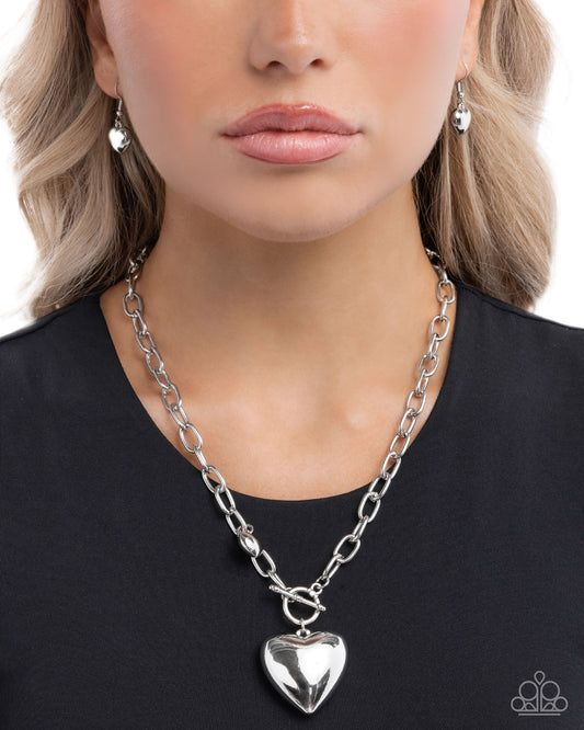 Heartfelt Hangout - Silver Oversized Heart Lariat Closure Pendant Necklace Paparazzi N3509