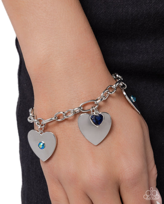 Paparazzi In Love With You - Blue & Blue Iridescent Zircon Rhinestone Silver Heart Charm Bracelet B1819