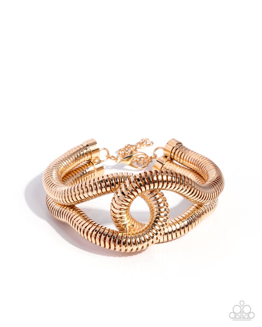 Interlocked Ignition - Gold Snake Chain Edgy Bracelet Paparazzi 2025 Convention Exclusive B2344