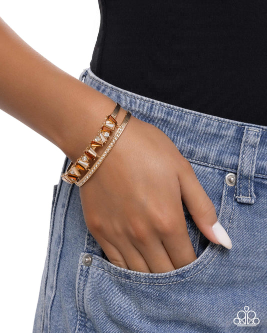 Sculpted Splendor - Brown Topaz, Light Peach Gem & White Rhinestone Gold Cuff Bracelet Paparazzi B2374