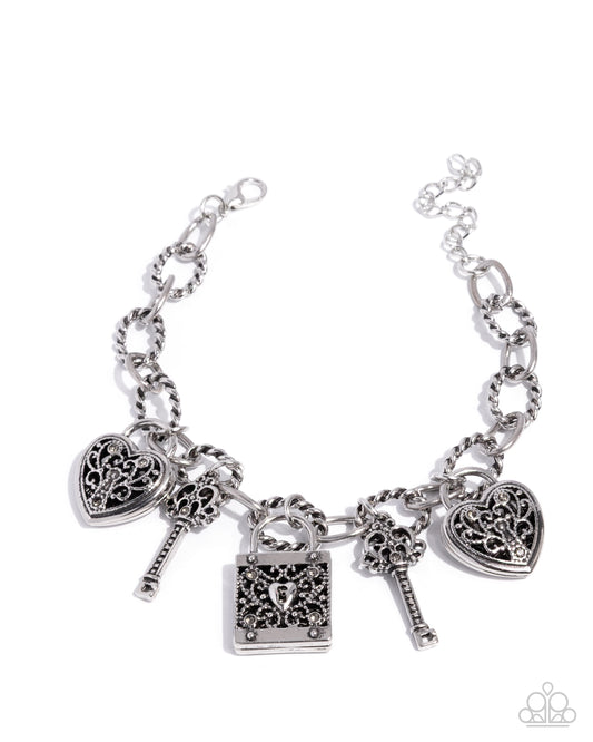 Flirty Filigree - Silver Heart Padlock, Keys, Square Padlock Smoky Rhinestone Charm Style Bracelet Paparazzi B2386