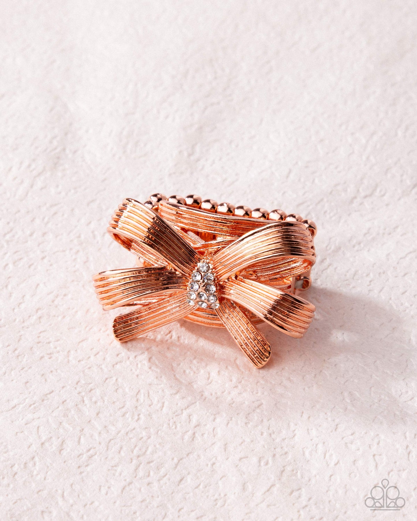 Paparazzi Gathered Glam - Copper - Shiny Copper Bow & White Rhinestone Ring R1303