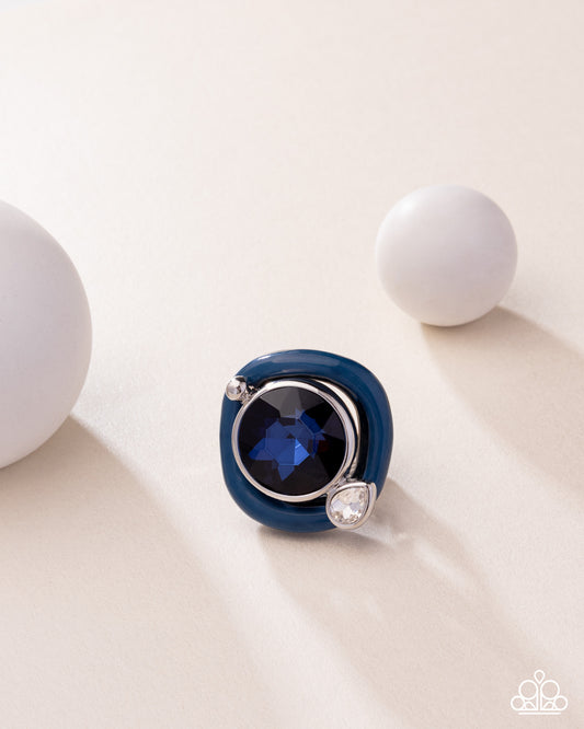 Colorful Caliber - Blue - Lyons Blue Painted Frame & Oversized Blue Gem Ring Paparazzi 2025 Convention Exclusive R1140