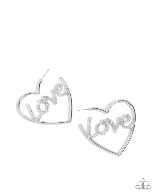 Paparazzi Lovely Cadence - White Rhinestone "Love" 2 Inch Heart Hoop Earring Life Of The Party December 2025