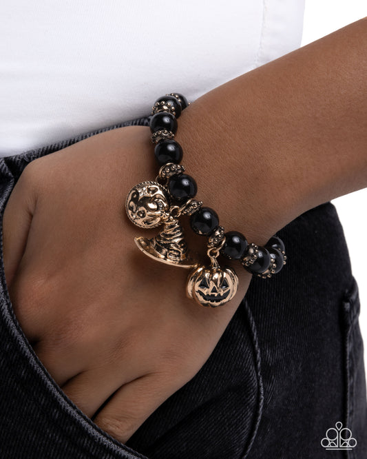 Halloween Homage - Black Bead Antiqued Gold Charm Jack O' Lantern, Witch Hat & Moon Stretch Bracelet Paparazzi B2437