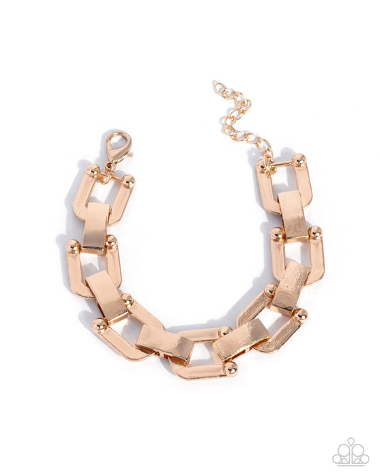 Paparazzi Self-Assured Statement - Gold Linked Western Stirrup High Sheen Bracelet