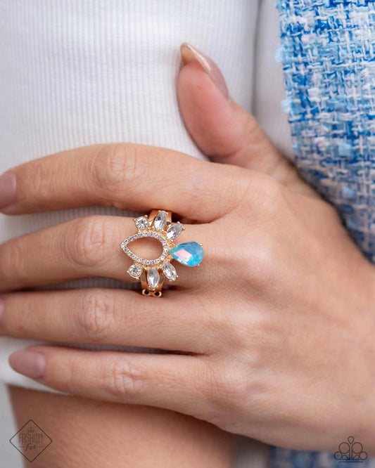 Heirloom Heaven Gold White Rhinestone & Opalescent Blue Gem Ring Fiercely 5th Avenue Fashion Fix May 2024 Paparazzi R0721