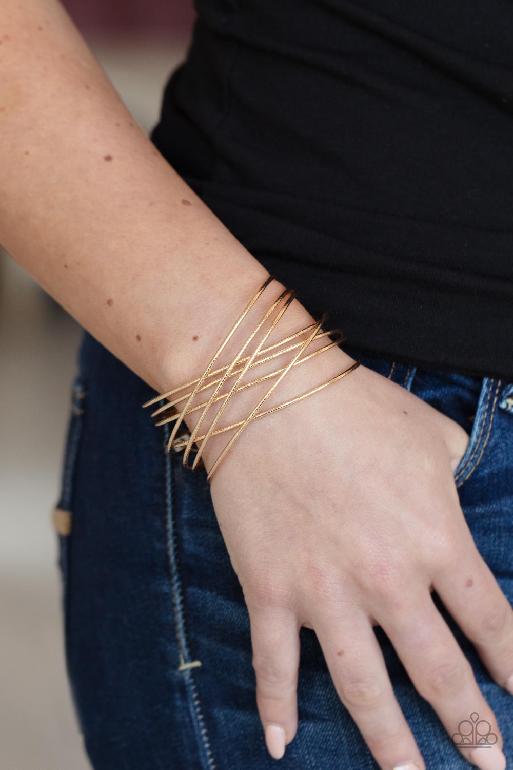 Strike Out Shimmer - Gold Crisscross Cuff Bracelet Paparazzi B1043