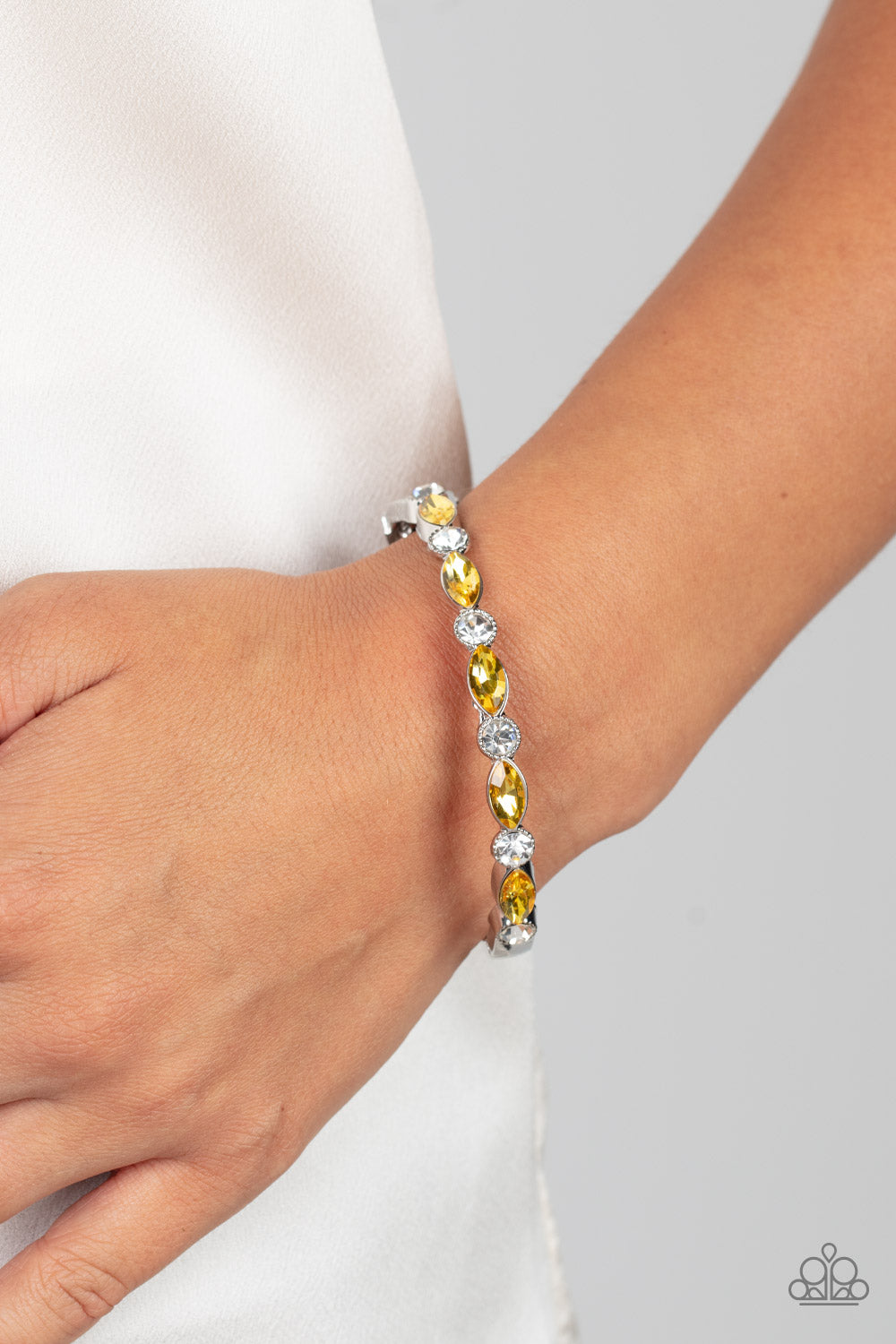 Petitely Powerhouse - Yellow & White Rhinestone Hinge Bracelet Paparazzi B1244