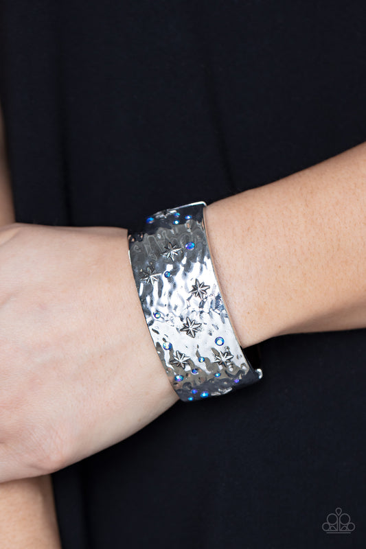 Across the Constellations - Blue Iridescent Rhinestone Silver Stars Hinged Bracelet Paparazzi B0265