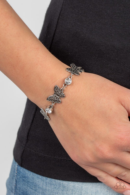 Has a WING to It - White Rhinestone Silver Butterfly Bracelet Paparazzi B0548