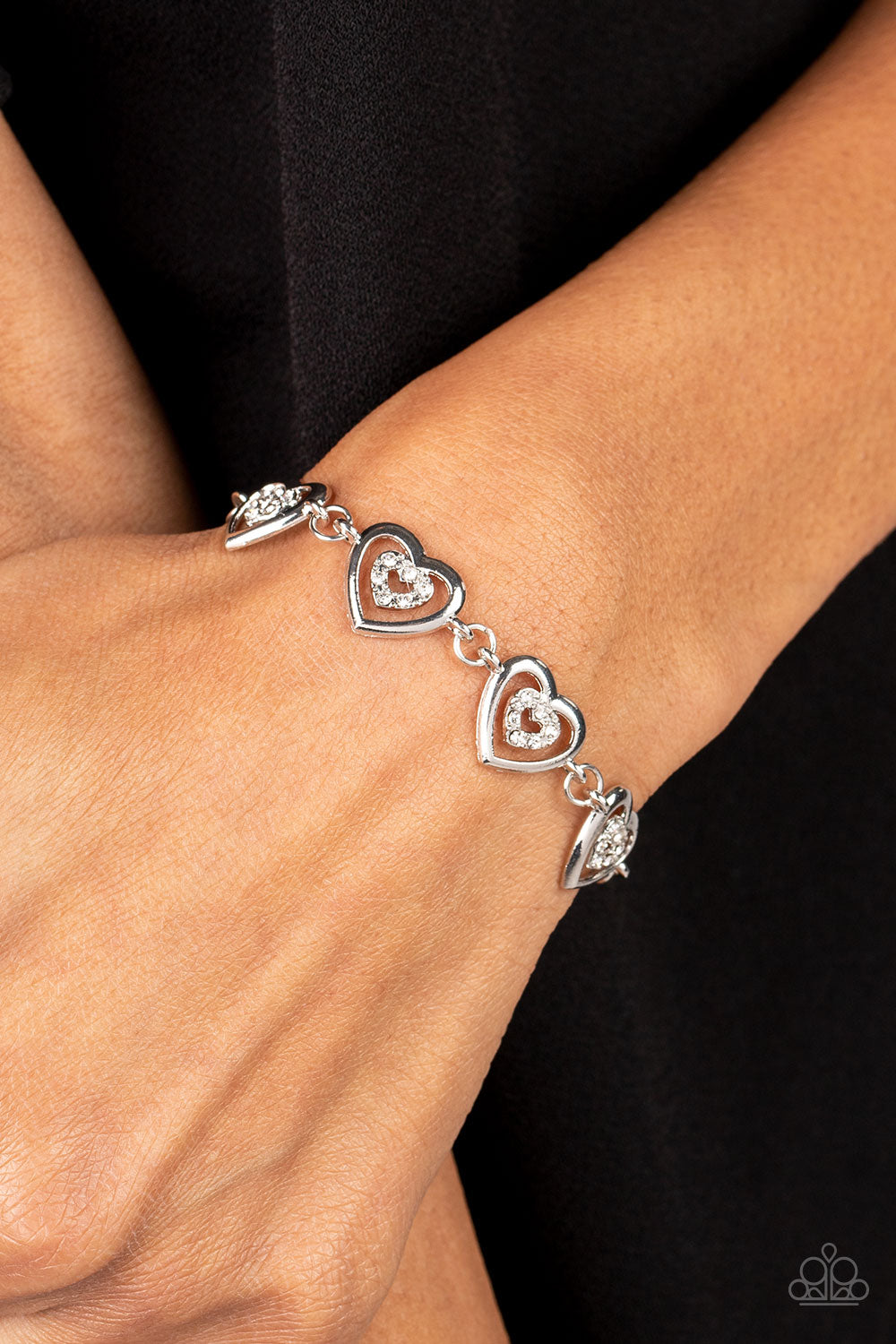 Catching Feelings - White Rhinestone & Silver Heart Bracelet Paparazzi B0881