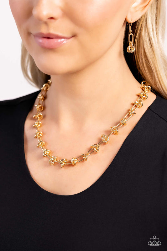 Knotted Kickoff - Gold Knot & Paperclip Chain Edgy Necklace Paparazzi N2150