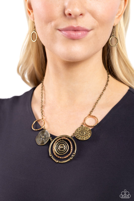 Mysterious Masterpiece - Brass & Gold Hammered Statement Necklace Paparazzi N2133