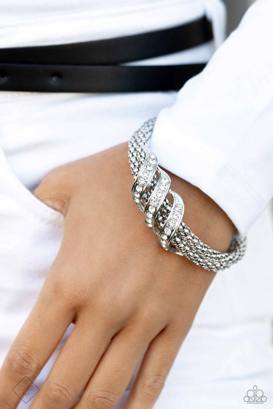 Tangible Taste - White Rhinestone Bendable Silver Strand Bracelet 5th Ave Fashion Fix February 2024 Paparazzi B1490