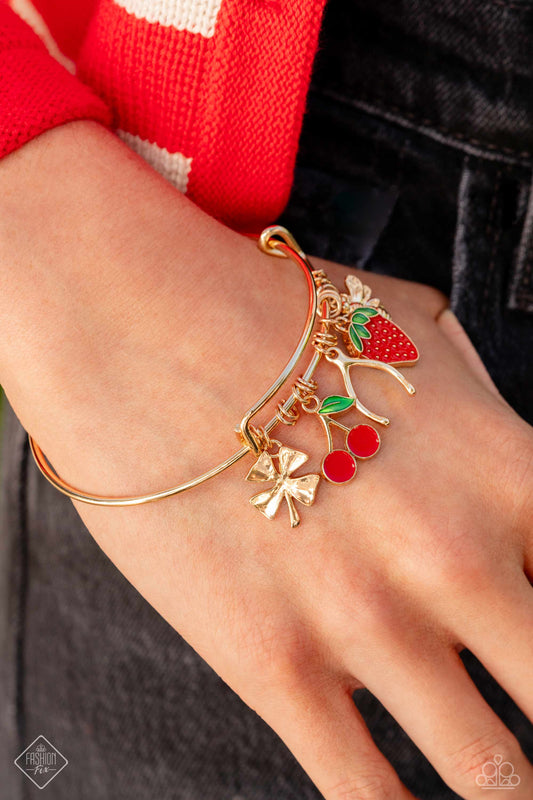 Fruit Freestyle - Gold Good Luck & Red Fruit Charm Bangle Bracelet Fashion Fix March 2024 Paparazzi B1479